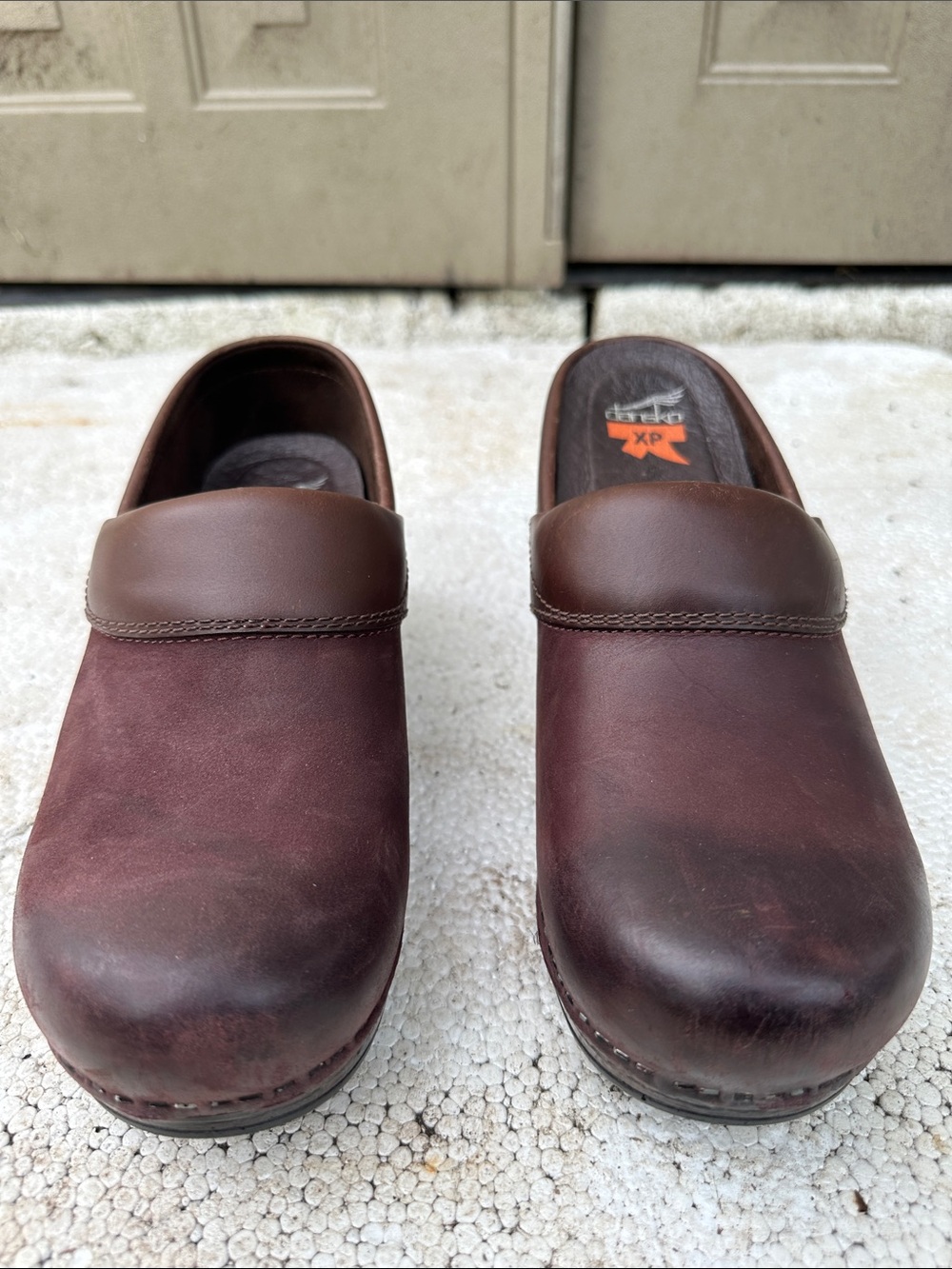 Dansko Brown Leather Slip-On Clogs in Chestnut